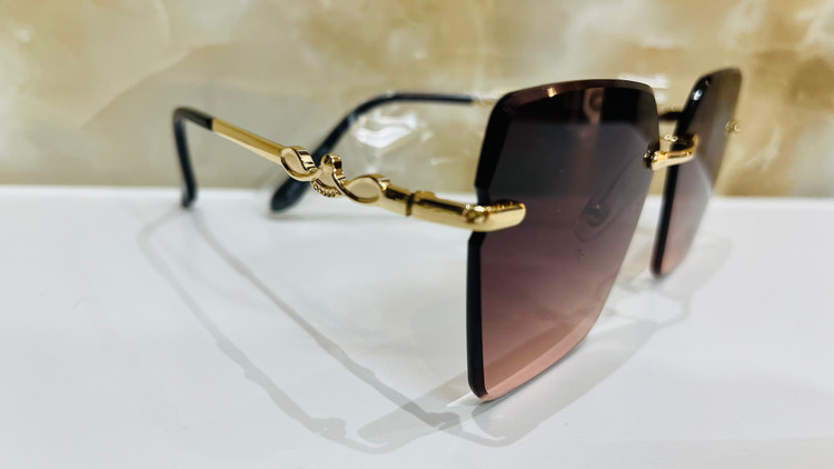 عینک آفتابی زنانه بدون فریم (Rimless) لنز گرادیانت دسته فلزی طلایی | مدل لاکچری